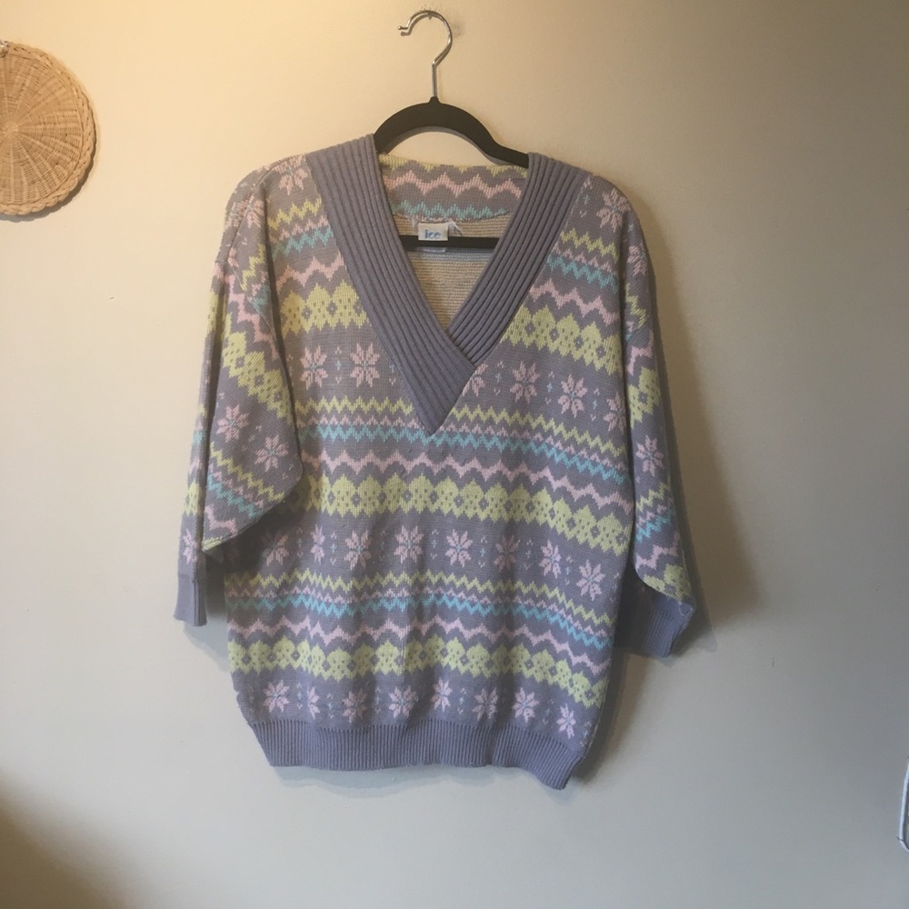 Vintage ice size large deep v neckline pullover.